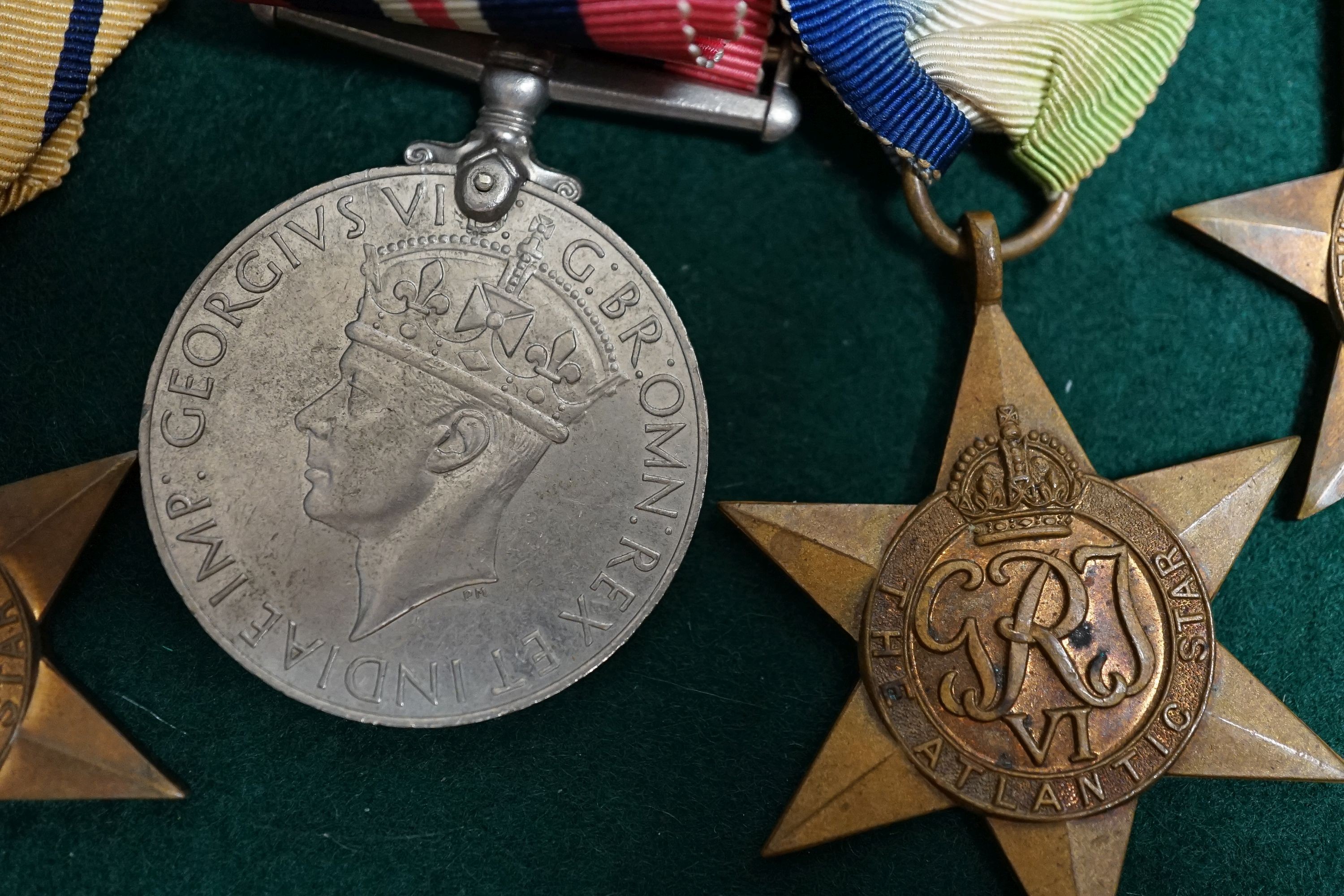 A George VI Efficiency medal to 885238 SJT. R. .BURRIDGE .R.A. various unnamed WW2 medals and miniatures